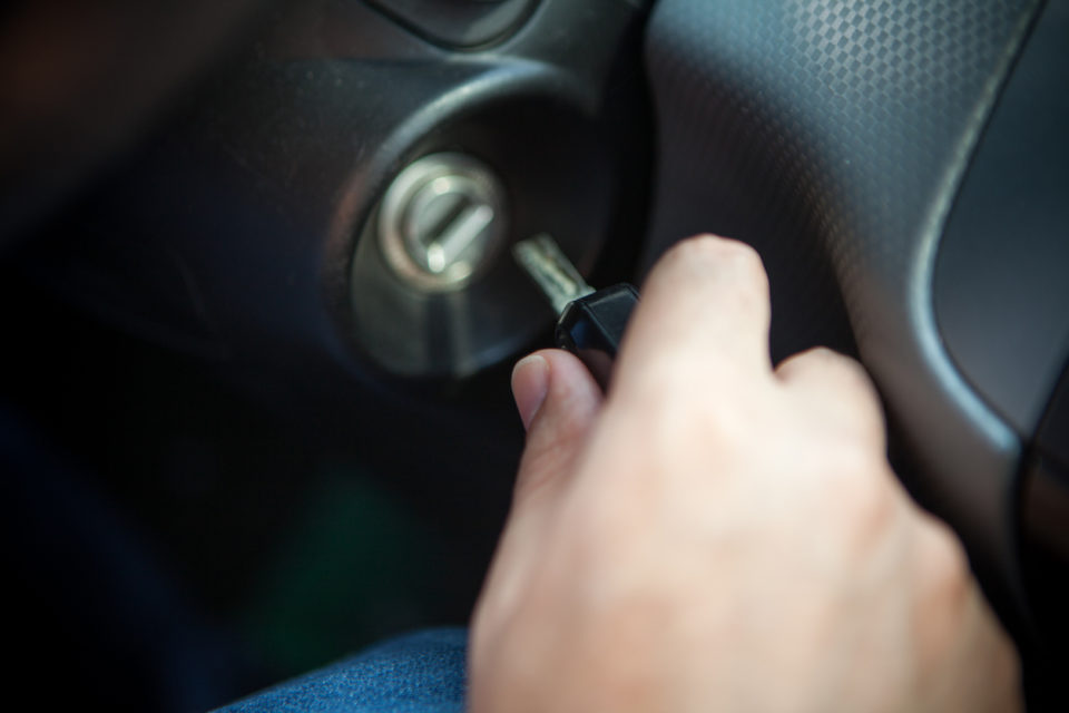 Man starting the car